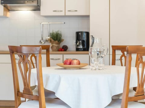 Table, Tableware, Furniture, Property, Dishware, Chair, Drinkware, Cabinetry, Wood, Interior Design