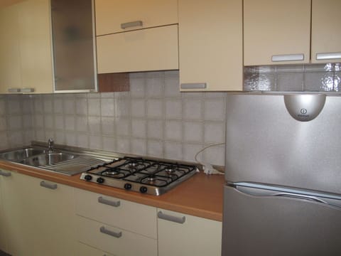 Cabinetry, Countertop, Gas Stove, Kitchen Stove, Kitchen Appliance, Cooktop, Kitchen, Home Appliance, Stove, Major Appliance