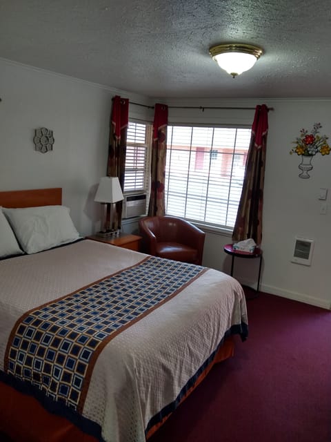 Room, 2 Queen Beds, Non-smoking | Premium bedding, individually decorated, individually furnished, desk