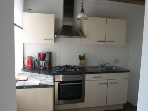 Cabinetry, Countertop, Property, Kitchen Stove, Kitchen Sink, Kitchen Appliance, Building, Kitchen, Sink, Interior Design