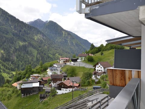 Sky, Building, Cloud, Property, Mountain, Nature, Infrastructure, Wood, House, Highland
