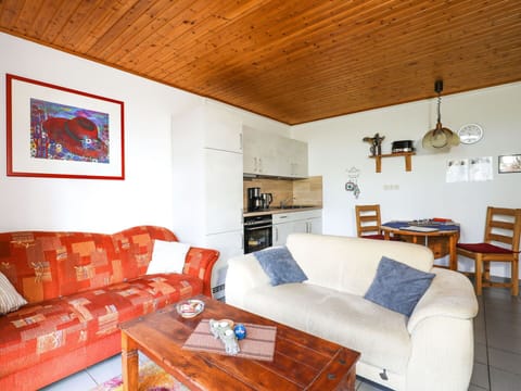 Couch, Furniture, Property, Table, Picture Frame, Wood, Living Room, Lighting, Orange, Interior Design