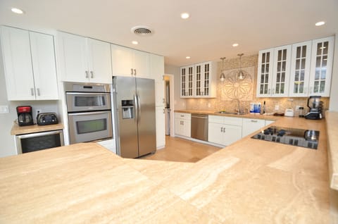 Spacious Open Kitchen (Fully Equipped) Features Counter Dining