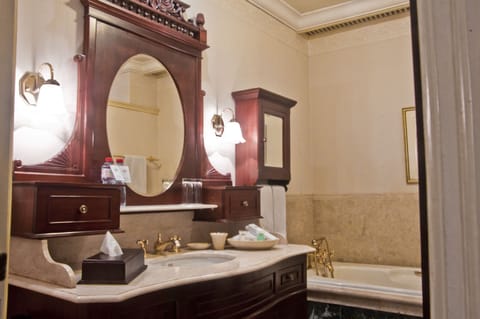 Classic Room, 1 King Bed | Bathroom | Separate tub and shower, eco-friendly toiletries, hair dryer, bathrobes