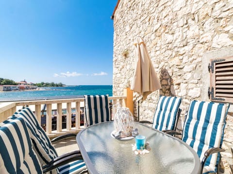 Table, Furniture, Property, Sky, Water, Blue, Chair, Seaside Resort, Azure, Building