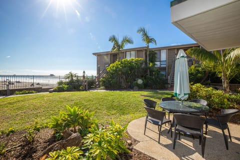 Enjoy watching sailboats and surfers from your patio and grassy yard.