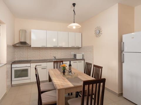 Furniture, Interior Design, Flooring, Floor, Wood, Kitchen, Kitchen Appliance, Major Appliance, Room, Ceiling