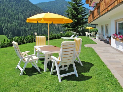 Plant, Furniture, Green, Building, Tree, Outdoor Furniture, Outdoor Table, Chair, Table, Shade
