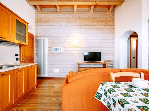 Cabinetry, Furniture, Building, Property, Wood, Comfort, Orange, Interior Design, Lighting, Drawer