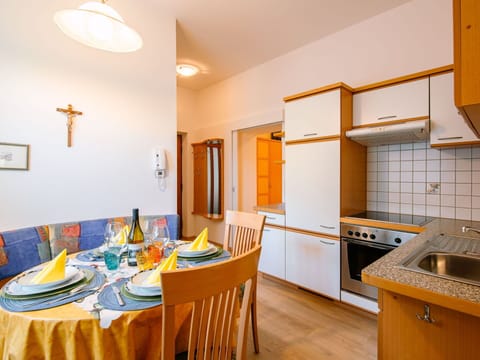 Furniture, Property, Table, Kitchen Sink, Sink, Cabinetry, Countertop, Kitchen Stove, Orange, Wood