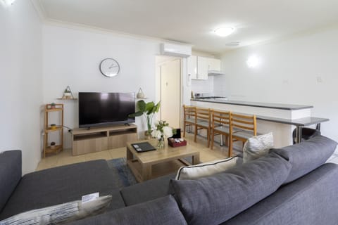 Deluxe Apartment, 1 Bedroom | Living area | 49-inch flat-screen TV with digital channels, Smart TV, Netflix