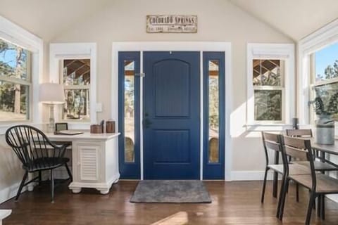 Front door with a dedicated work space and kitchen table