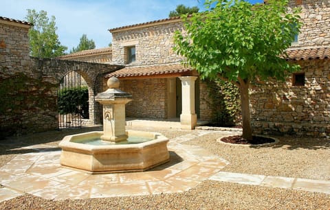 With Provence-influenced architecture, enjoy strolling around the residence on a warm day.