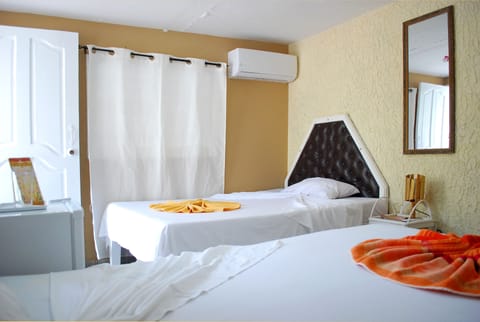 Basic Room, 2 Double Beds | Minibar, blackout drapes, free WiFi, bed sheets