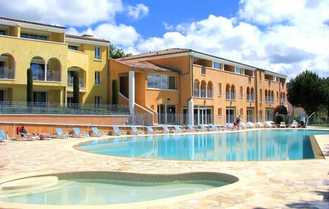 Dive into the outdoor pool on a hot summer day.
