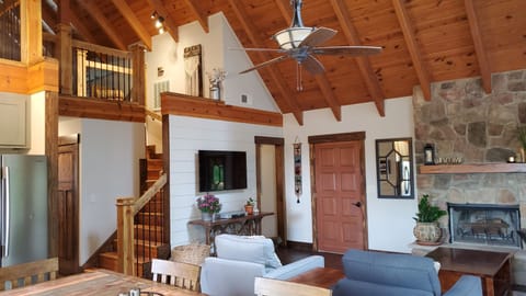 Living Room with beautiful fireplace and open concept living space.