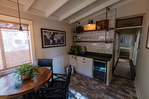 Gameroom is off the patio entrance with built-in mini-fridge