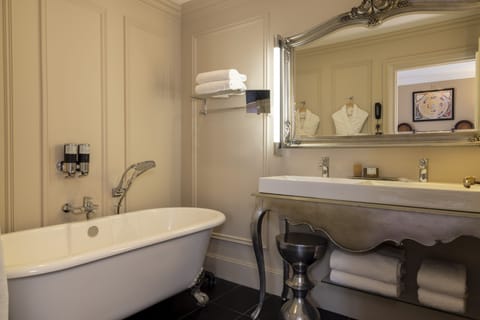 Superior Suite | Bathroom | Designer toiletries, hair dryer, bathrobes, slippers