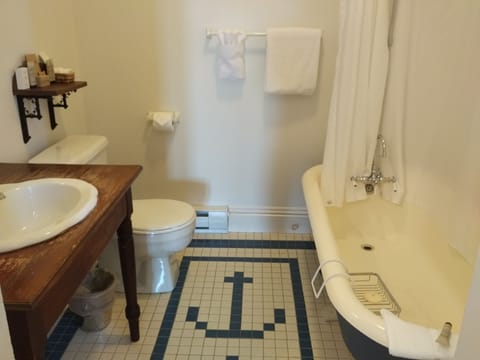 Luxury Suite, 1 Bedroom | Bathroom | Combined shower/tub, free toiletries, hair dryer, bathrobes