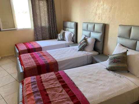Triple Room | Blackout drapes, free WiFi, bed sheets