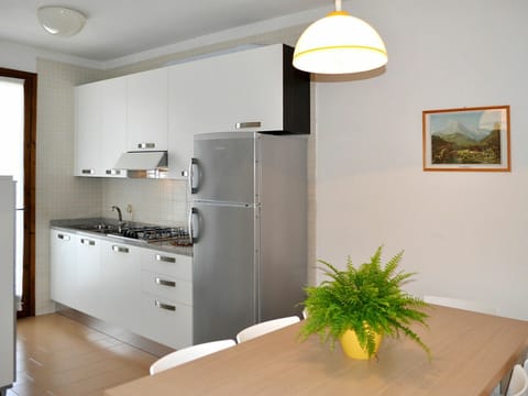 Room, White, Furniture, Property, Interior Design, Ceiling, Cabinetry, Floor, Yellow, Building