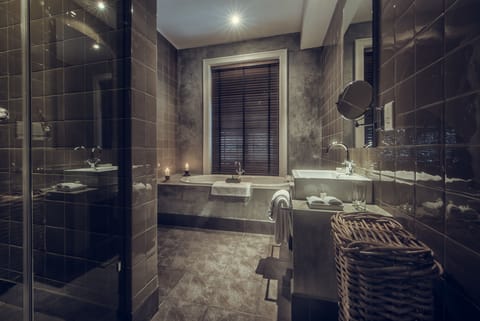 Royal Suite, 1 King Bed | Bathroom | Combined shower/tub, deep soaking tub, free toiletries, bathrobes