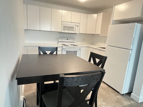 Premium Studio Suite | Private kitchen | Microwave, toaster