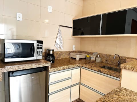 Comfort Apartment | Private kitchen | Mini-fridge, highchair, cookware/dishes/utensils