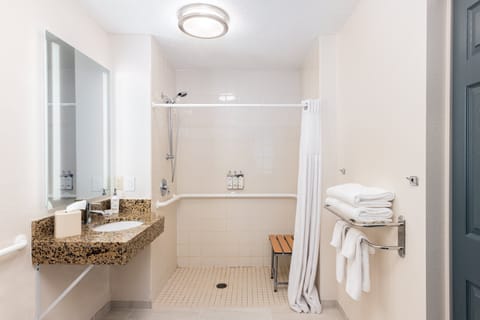 Suite, 1 Bedroom, Accessible (Comms Accessible. Roll-In Shower) | Bathroom | Combined shower/tub, free toiletries, hair dryer, towels