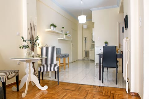 Standard Apartment | Living area | Flat-screen TV, offices