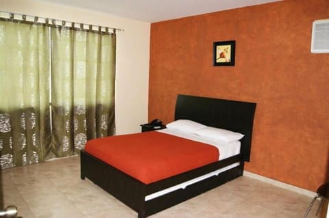 Standard Single Room | Blackout drapes, iron/ironing board, free wired internet, bed sheets