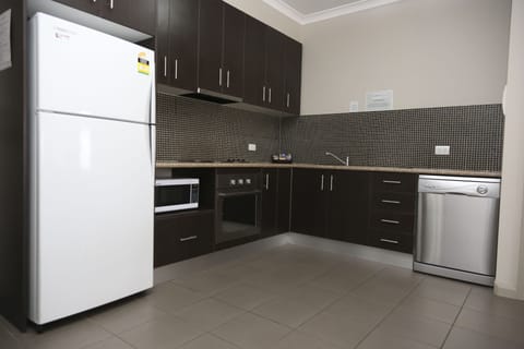 Two Bedroom Apartment | Private kitchen | Fridge, microwave, electric kettle, toaster