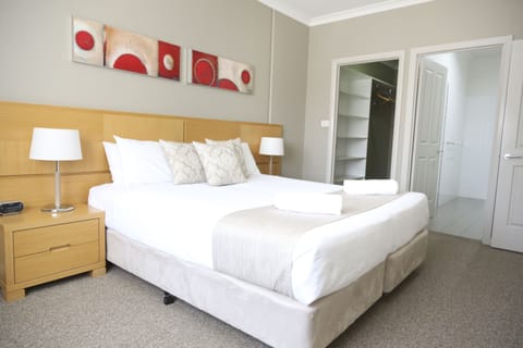 Two Bedroom Apartment | Premium bedding, desk, laptop workspace, blackout drapes