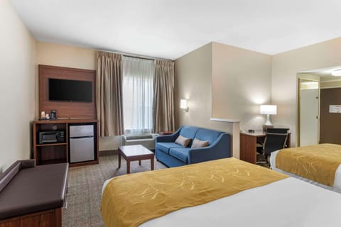 Suite, 2 Queen Beds, Non Smoking | Desk, laptop workspace, blackout drapes, iron/ironing board