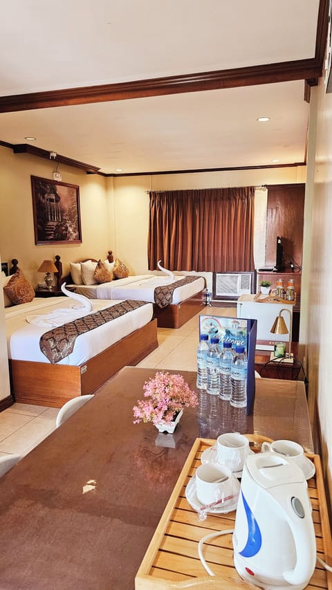 Executive Room, 2 Queen Beds, Pool View | Hypo-allergenic bedding, in-room safe, individually decorated