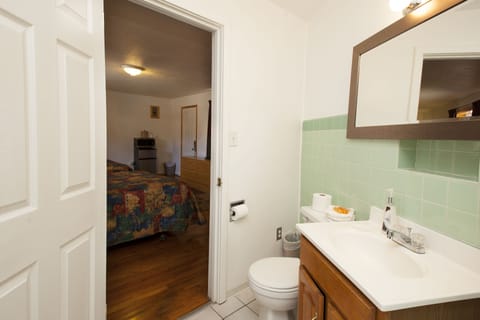 Standard Room, 2 Queen Beds | Bathroom | Shower, hair dryer, towels