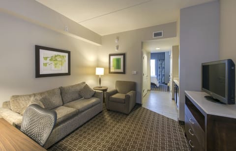 Junior Suite, 1 King Bed with Sofa bed | Living area | 43-inch Smart TV with cable channels, TV