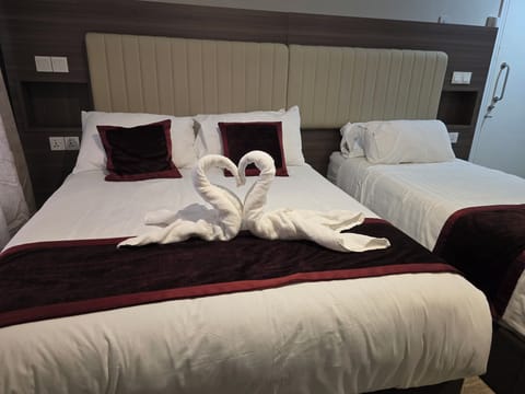 Pillowtop beds, desk, free WiFi, bed sheets