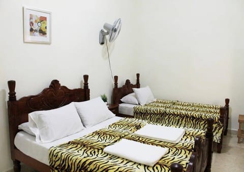 Deluxe Triple Room | Individually decorated, individually furnished, iron/ironing board