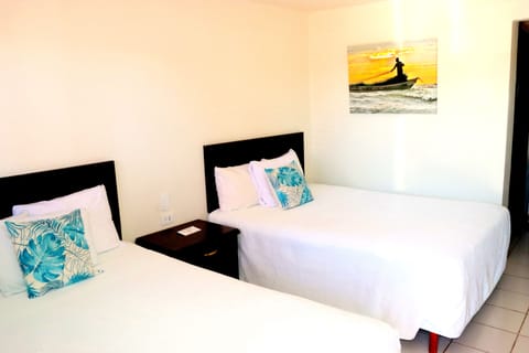 Comfort Double Room, 2 Queen Beds, Beach View | Iron/ironing board, free WiFi, bed sheets