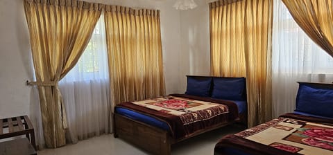 Economy Quadruple Room, 1 Bedroom | Bed sheets