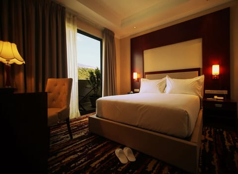 Family Room | Premium bedding, minibar, in-room safe, individually decorated