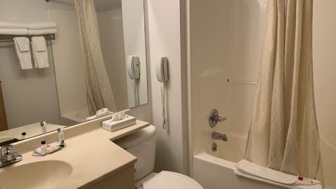 Standard Room, 2 Queen Beds | Bathroom | Combined shower/tub, free toiletries, hair dryer, towels