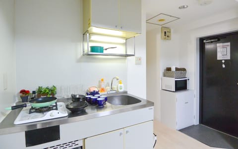 Family Apartment (702) | Private kitchen | Fridge, microwave, stovetop, electric kettle