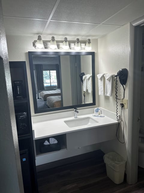 Standard Room, 2 Queen Beds, Non Smoking | Bathroom | Hair dryer, towels