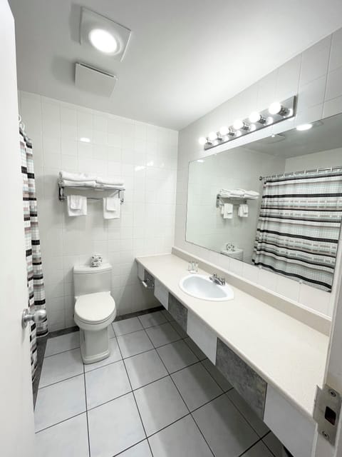 Room, 2 Queen Beds, Non Smoking (Efficiency) | Bathroom | Combined shower/tub, deep soaking tub, hair dryer, towels