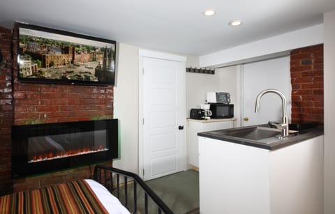 J HAMILTON GRAY  SUITE 10 (basement unit) 2 Beds, Fireplace | Bathroom | Shower, hydromassage showerhead, free toiletries, hair dryer