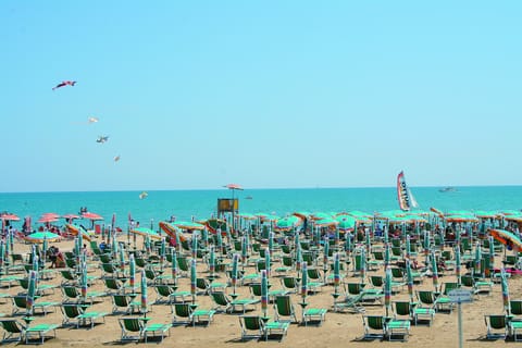 Beach nearby, sun loungers, beach umbrellas