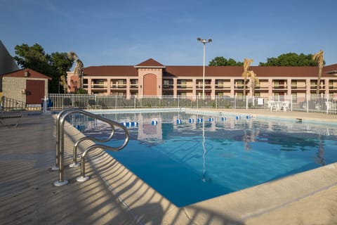 Seasonal outdoor pool, open 10:00 AM to 8:30 PM, sun loungers