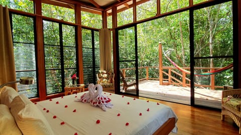 Superior Tree House, 1 King Bed, Garden View (Gumbo Limbo & Guanacaste) | Pillowtop beds, in-room safe, individually decorated